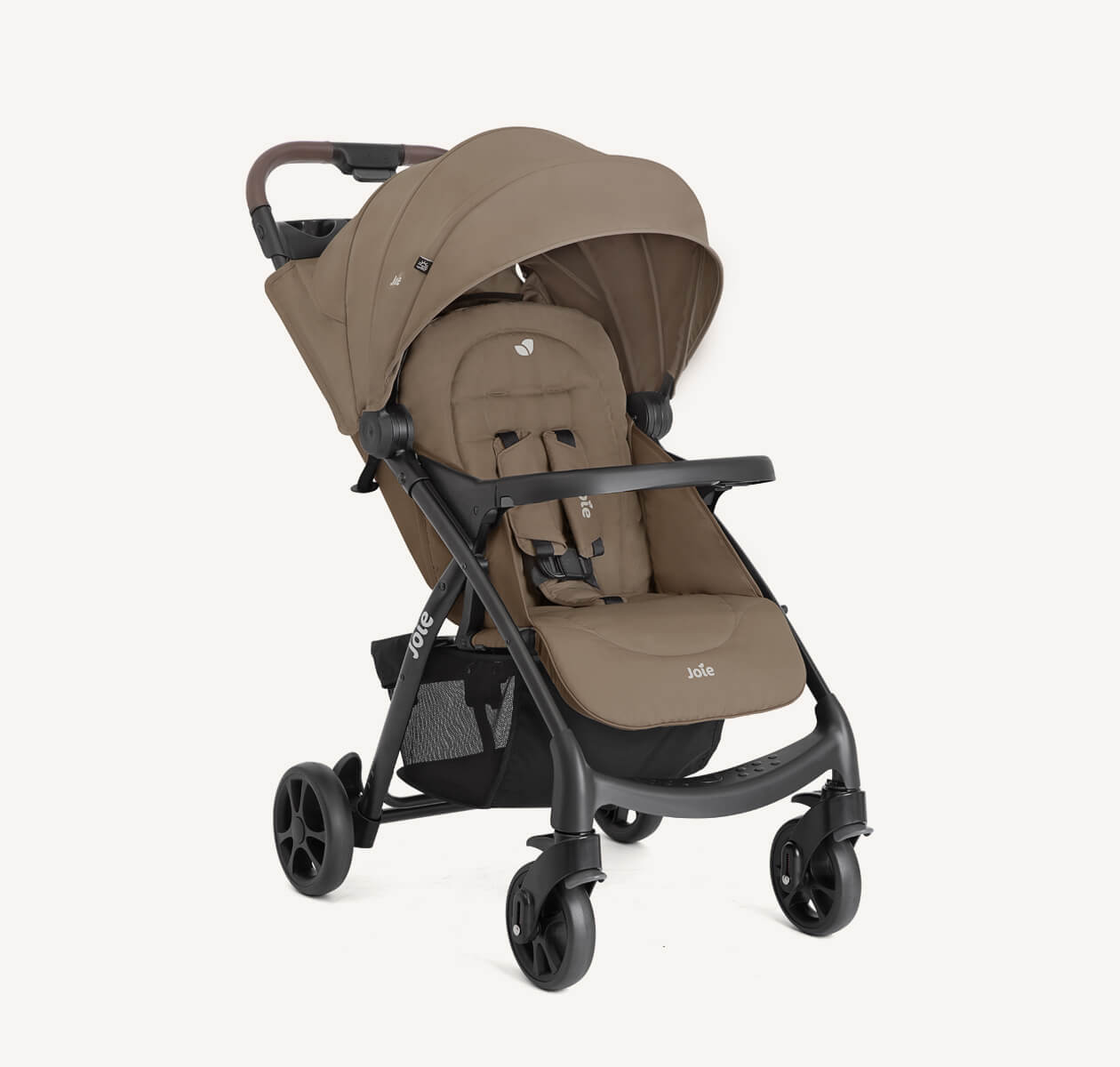 Joie muze lx stroller in tan positioned at a right angle.