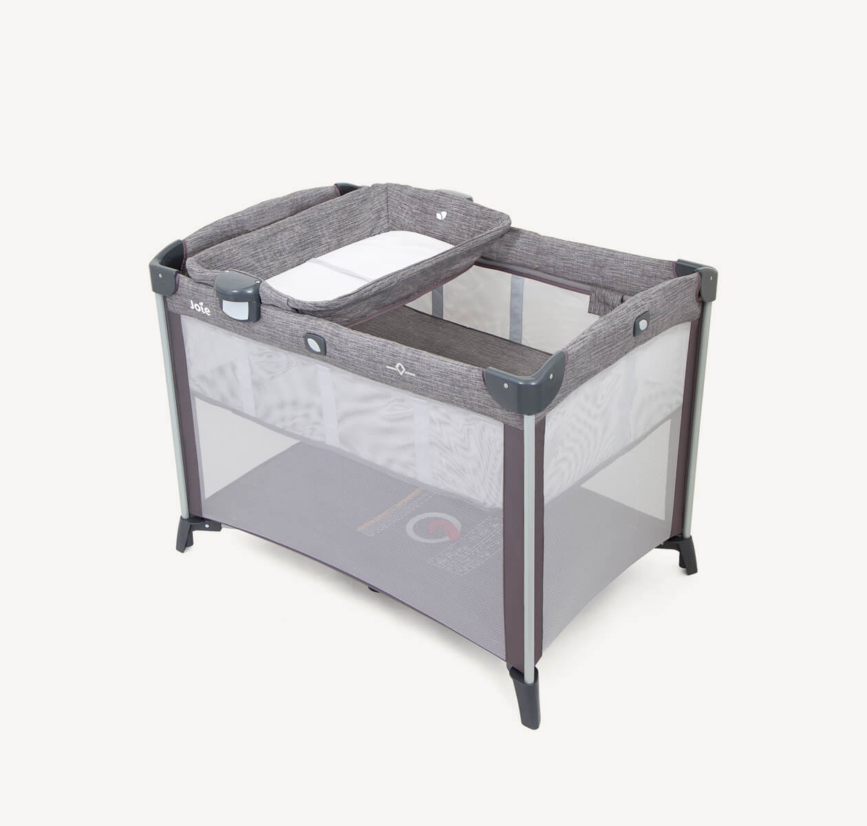 The Joie travel cot commuter change in grey with a bassinet and changer at a left angle.