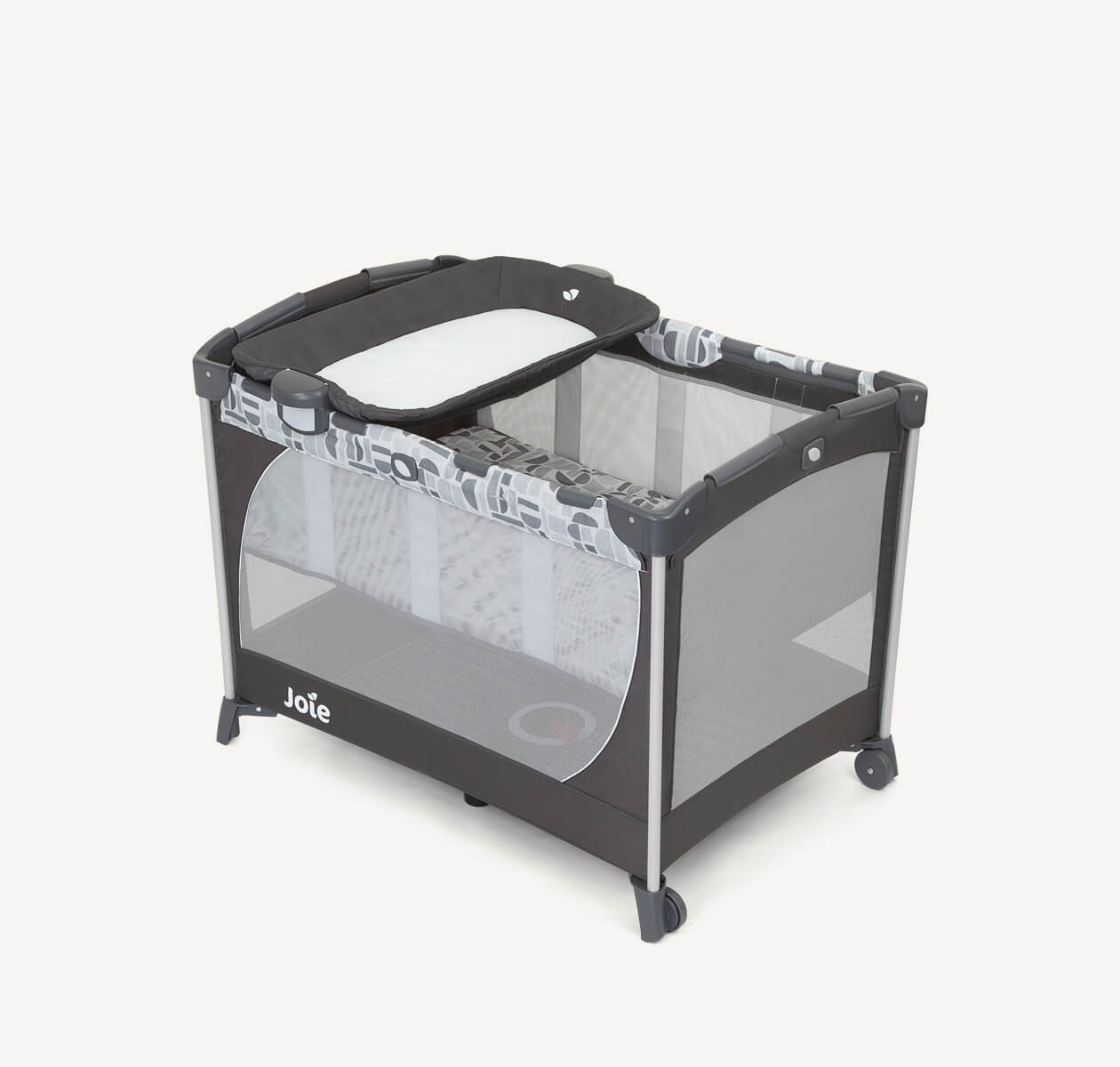The Joie travel cot commuter change in grey and blue pattern with a bassinet and changer at a left angle.