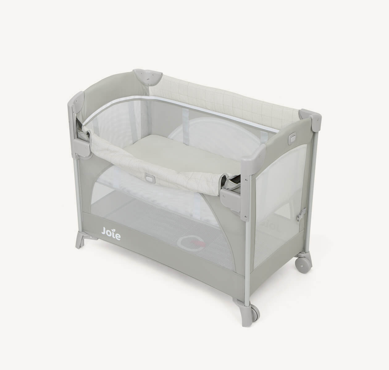 Joie kubbie sleep bedside cot in two-tone gray with drop down side down at an angle.