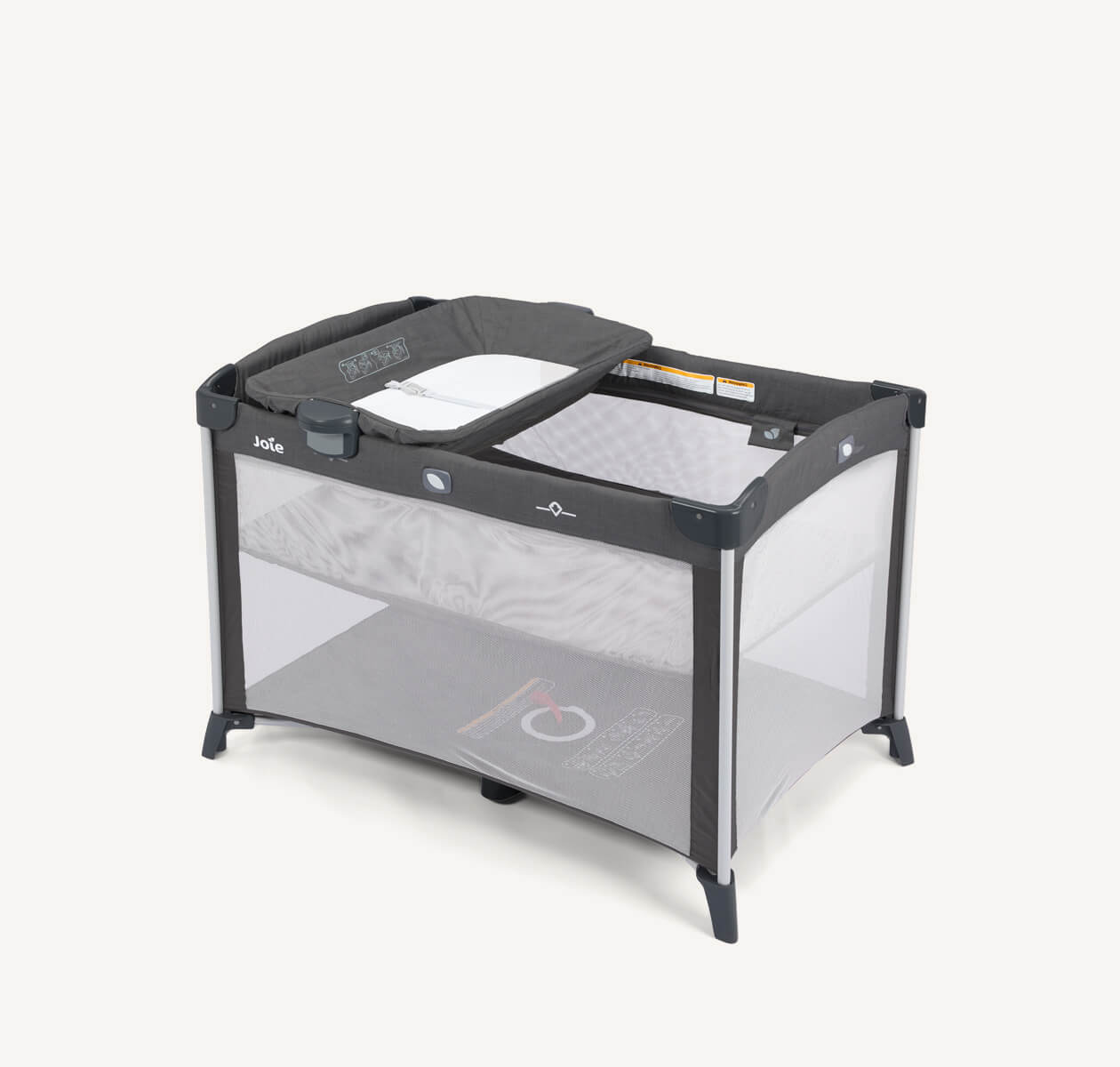 Joie Commuter Change travel cot in grey at a right angle.