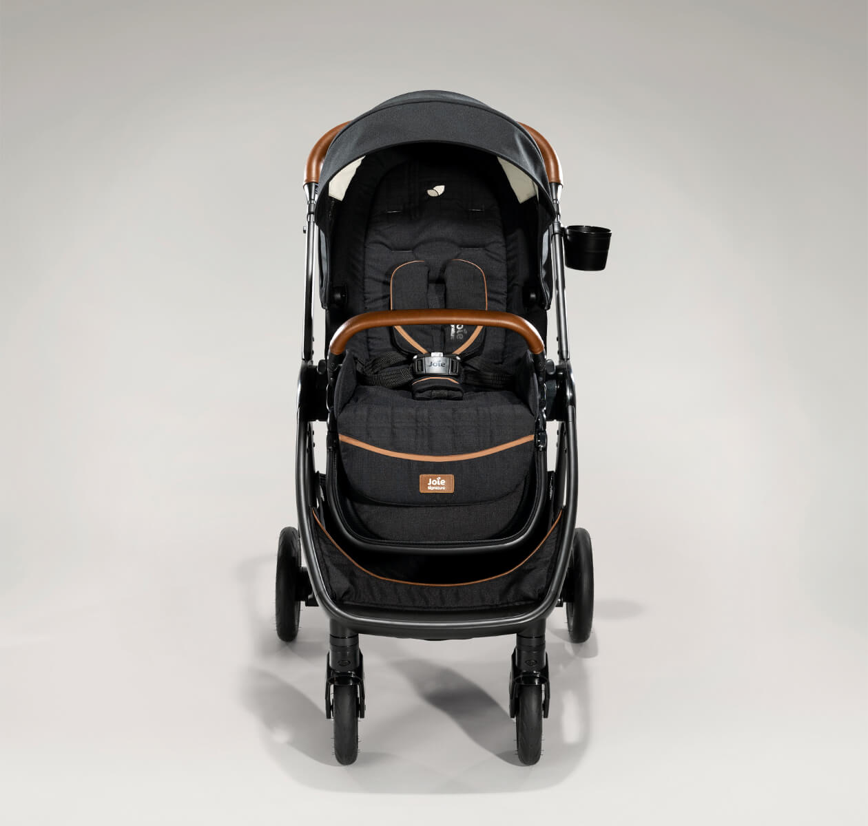 Joie finiti pram in black straight on.
