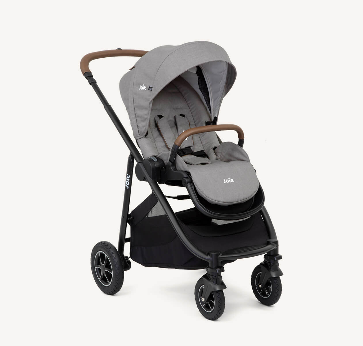  Joie light gray and black versatrax pram positioned at a right angle.