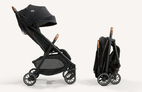 Joie Signature parcel stroller in black shown from a side view fully open and as a freestanding, compact fold.