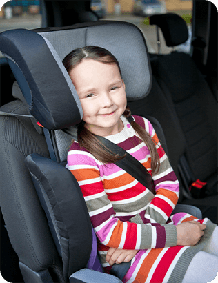 Child in Joie's Trillo high back booster car seat