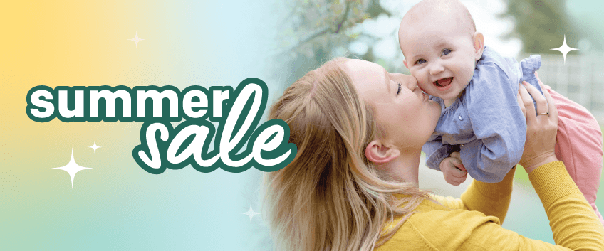 Mom smiling and holding happy baby in the air with information about Joie's summer sale