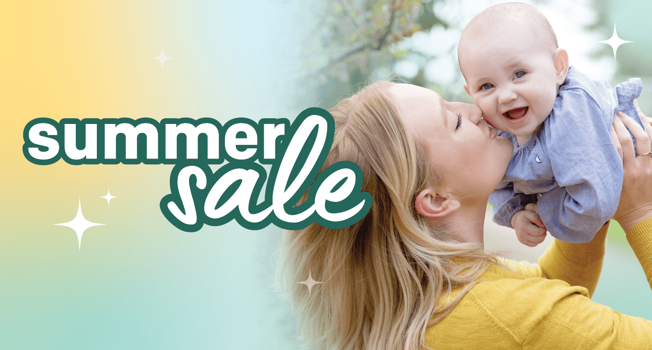 Mom smiling and holding happy baby in the air with information about Joie's summer sale