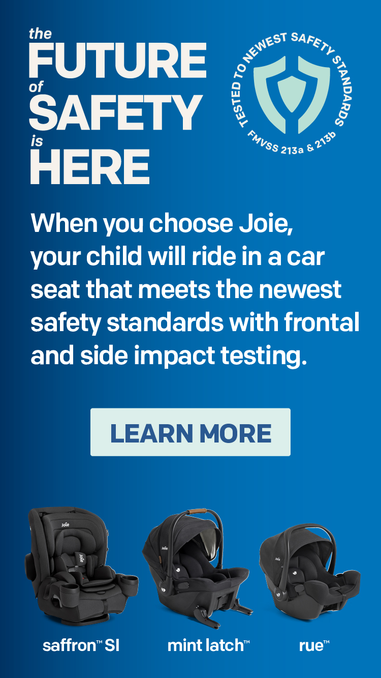 Alt text: Mom with baby sitting in saffron si car seat in car.